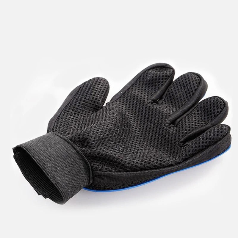 Dos du gant de toilettage en maille noire aérée avec son poignet élastique réglable