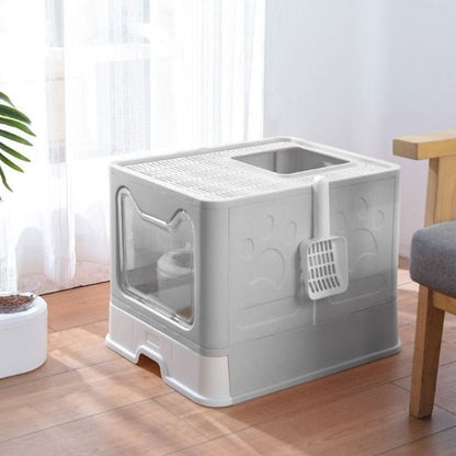 Maison de toilette pliable coloris gris vue de trois quarts arrière, pelle à litière accrochée sur le côté