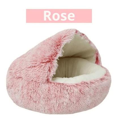 Panier rond douillet à capuche coloris rose, intérieur crème matelassé, sur fond blanc