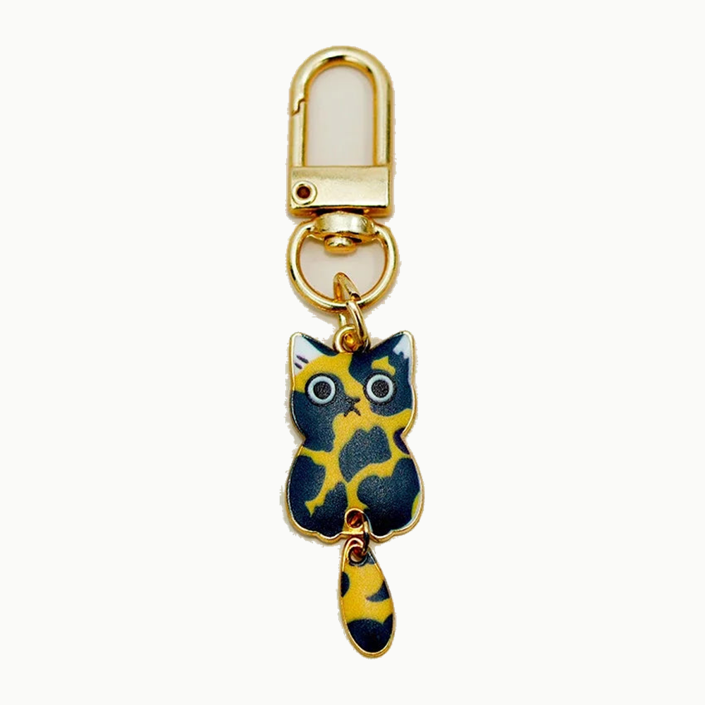 Porte-clés chat bleu et or en métal émaillé