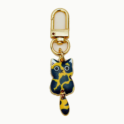 Porte-clés chat bleu et or en métal émaillé