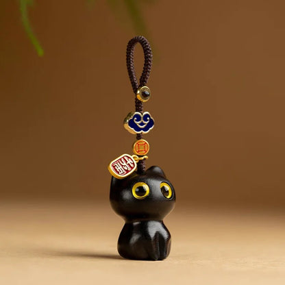 Porte-clés chat en bois sculpté, cordon tressé main | Mon Petit Grigri - Le Palais des Chats