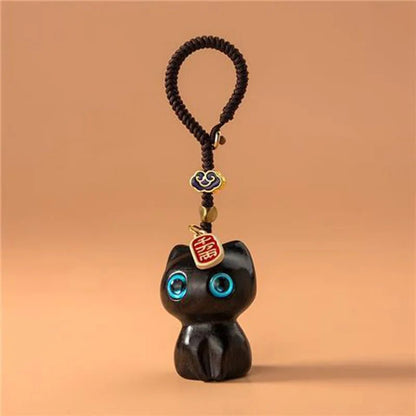 Porte-clés chat en bois sculpté, cordon tressé main | Mon Petit Grigri - Le Palais des Chats