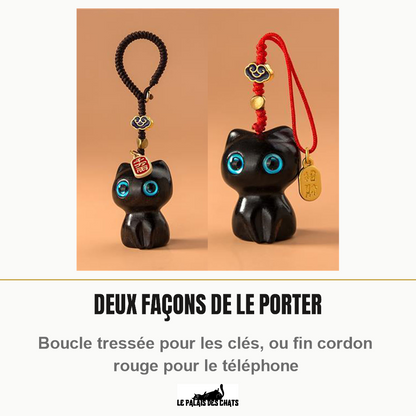 Les deux attaches du porte-clés chat Mon Petit Grigri : boucle épaisse tressée brun foncé pour les clés et fin cordon rouge pour le téléphone