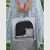 Sac à dos de transport pour chat ChatNomade porté en balade, chat installé à l'intérieur