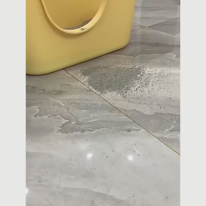 Démonstration du tapis de litière anti-projection Doux Pas Félin