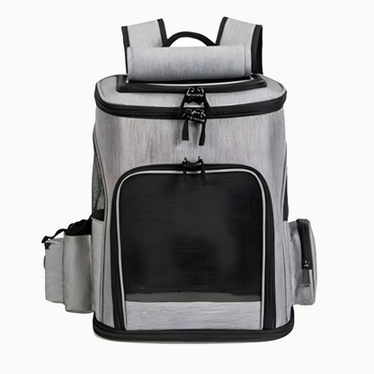 Sac à dos de transport gris vu de face, hublot en filet noir, poches latérales et bretelles rembourrées