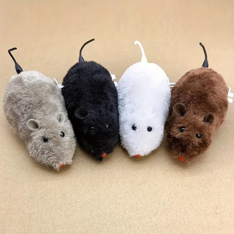 Quatre souris à remonter Ratatouille alignées, coloris gris, noir, blanc et brun