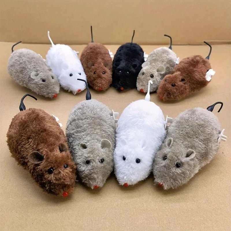 Douze souris à remonter Ratatouille disposées en arc, coloris gris, blanc, brun et noir